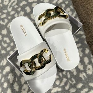 Brand new in box white with gold accent slide size 8